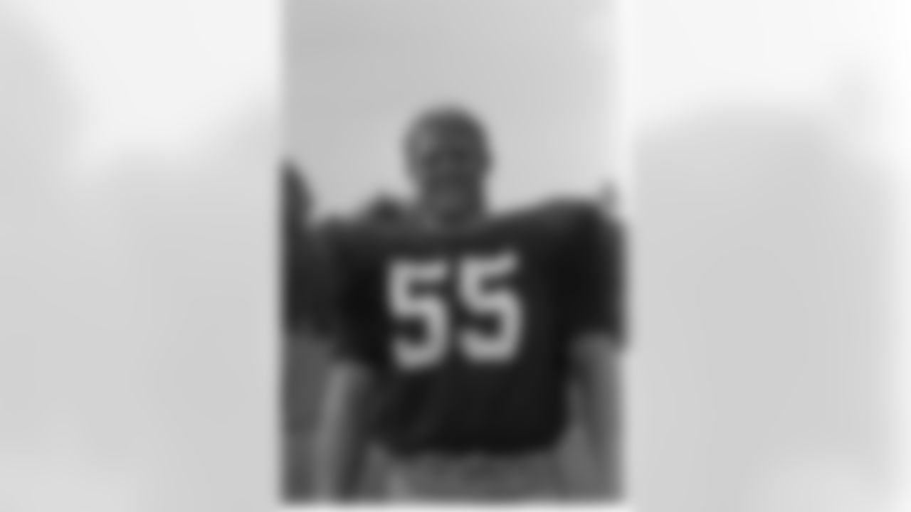 Action photograph of offensive lineman Jon Kolb #55 during his time with the Steelers.
