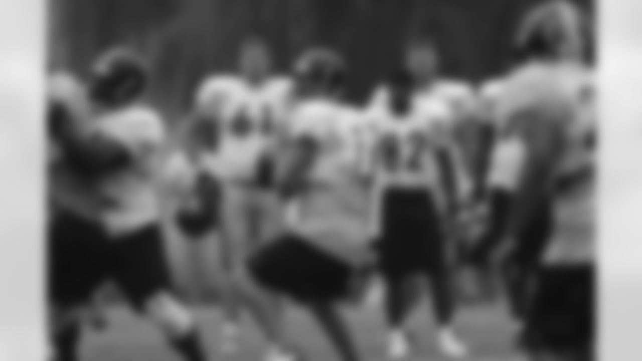 Action shot of Pittsburgh Steelers quarterback Ben Roethlisberger (7) during his first training camp at Saint Vincent College.