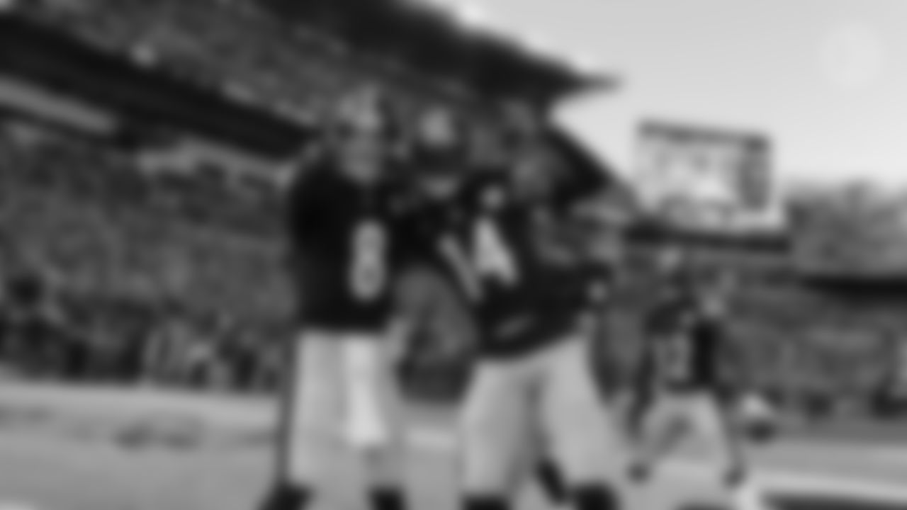 Pittsburgh Steelers quarterback Kenny Pickett (8) and Pittsburgh Steelers wide receiver George Pickens (14) during a regular season game between the Pittsburgh Steelers and the Cleveland Browns, Sunday, Jan. 8, 2023 in Pittsburgh, PA. (Arron Anastasia / Pittsburgh Steelers)