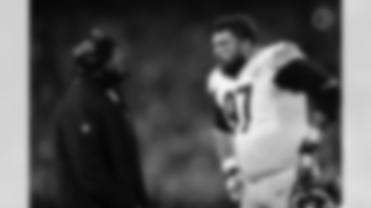 Pittsburgh Steelers Head Coach Mike Tomlin and Pittsburgh Steelers defensive tackle Cameron Heyward (97) during a postseason Wild Card Round game between the Pittsburgh Steelers and the Kansas City Chiefs, Sunday, Jan. 16, 2022 in Kansas City, MO. (Karl Roser / Pittsburgh Steelers)