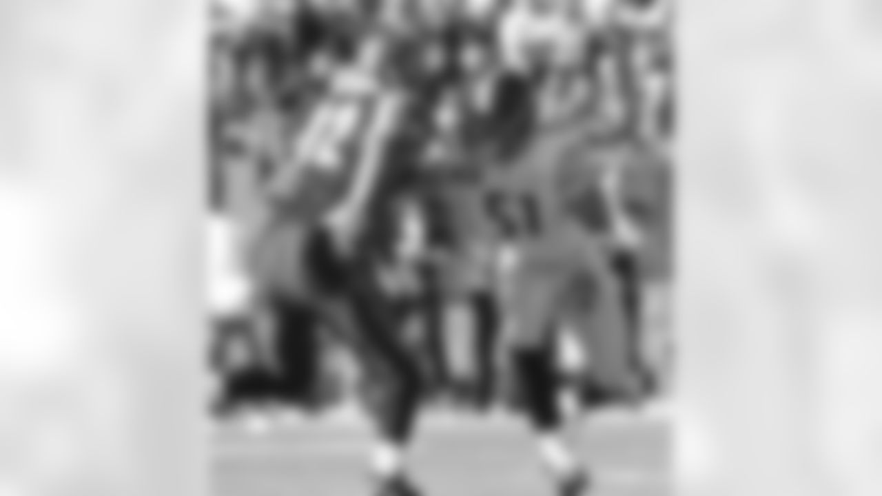 Action shot of linebacker James Farrior #51 during his time with the Pittsburgh Steelers.