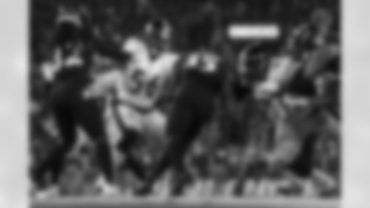 Pittsburgh Steelers linebacker Alex Highsmith (56) and Pittsburgh Steelers defensive tackle Cameron Heyward (97) during a regular season game between the Pittsburgh Steelers and the Baltimore Ravens, Sunday, Jan. 1, 2023 in Baltimore, MD. (Abigail Dean / Pittsburgh Steelers)