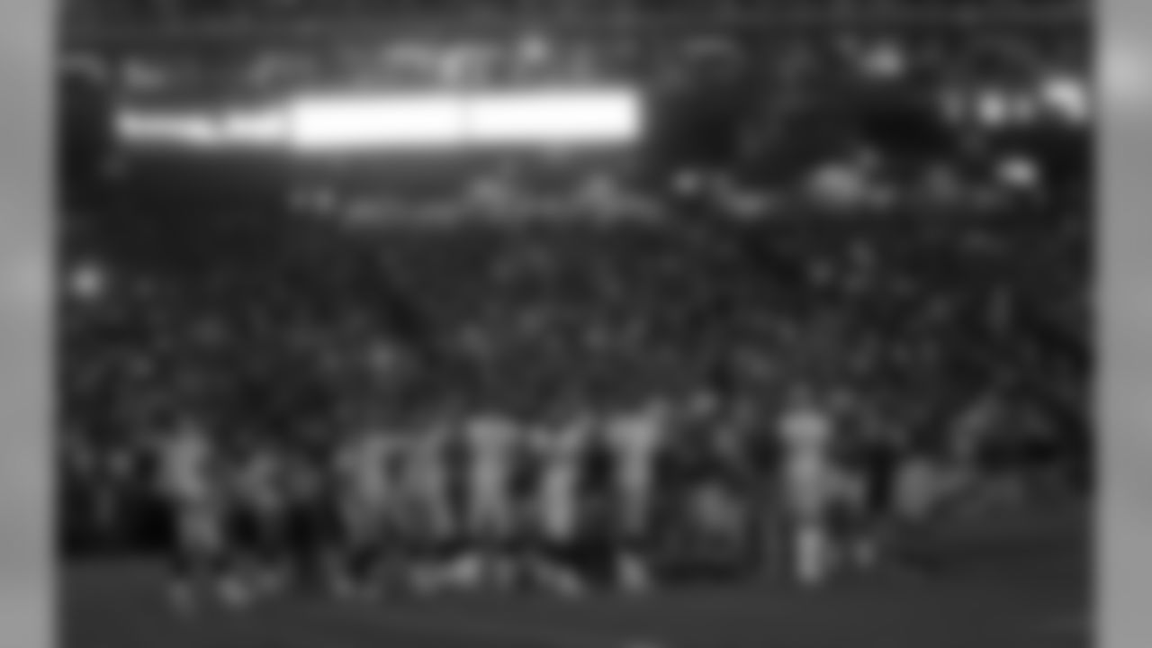 The Pittsburgh Steelers' offense and the San Francisco 49ers' defense stand on the field during a power outage during the second quarter of an NFL football game in San Francisco, Monday, Dec. 19, 2011. (AP Photo/Marcio Jose Sanchez)