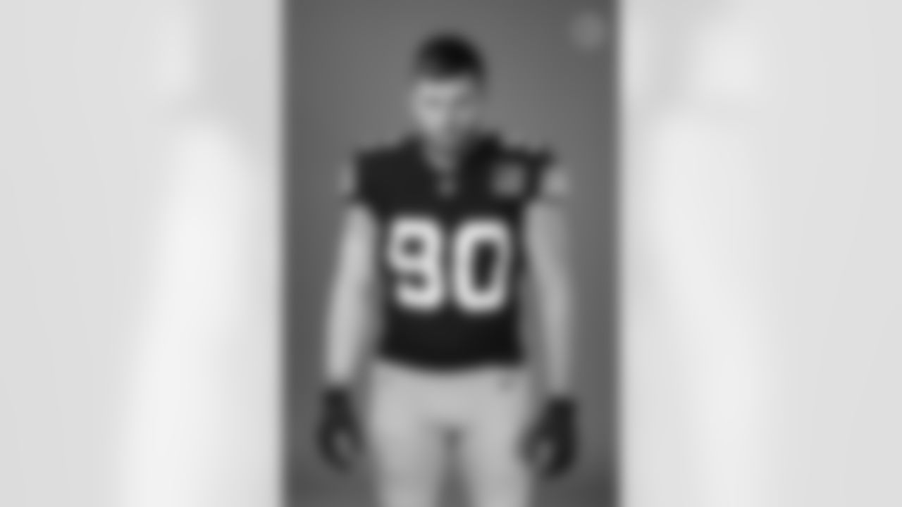 Pittsburgh Steelers linebacker T.J. Watt (90) wears the throwback uniform during a photoshoot, Tuesday, Nov. 15, 2022 in Pittsburgh, PA. (Karl Roser / Pittsburgh Steelers)