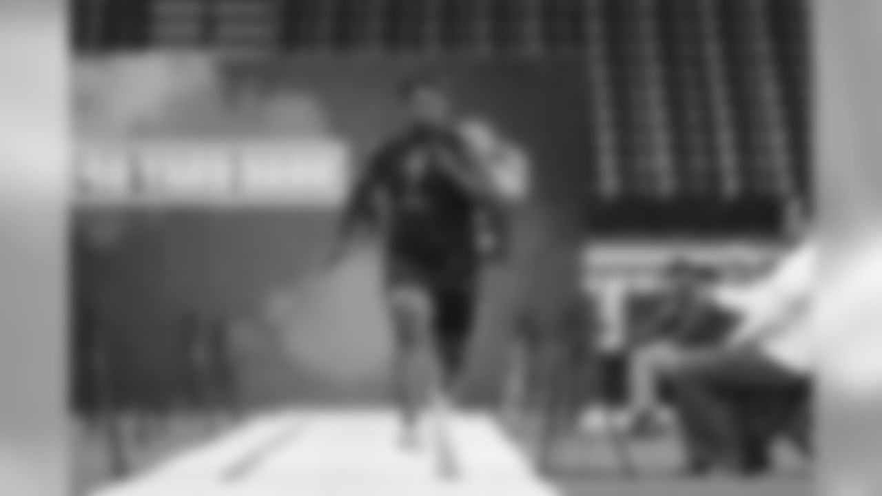 Nebraska defensive tackle Carlos Davis runs the 40-yard dash during the 2020 NFL Scouting Combine, Saturday, Feb. 29, 2020 in Indianapolis. (Ben Liebenberg via AP)