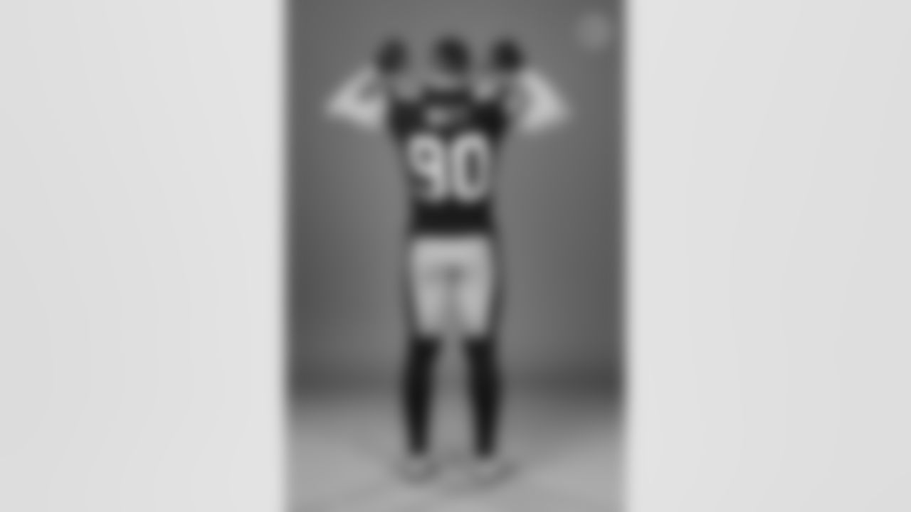 Pittsburgh Steelers linebacker T.J. Watt (90) wears the throwback uniform during a photoshoot, Tuesday, Nov. 15, 2022 in Pittsburgh, PA. (Karl Roser / Pittsburgh Steelers)