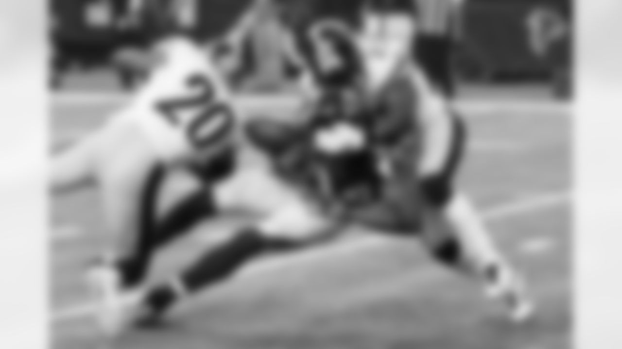 Brice McCain and Will Allen force a fumble against the Falcons at the Georgia Dome.