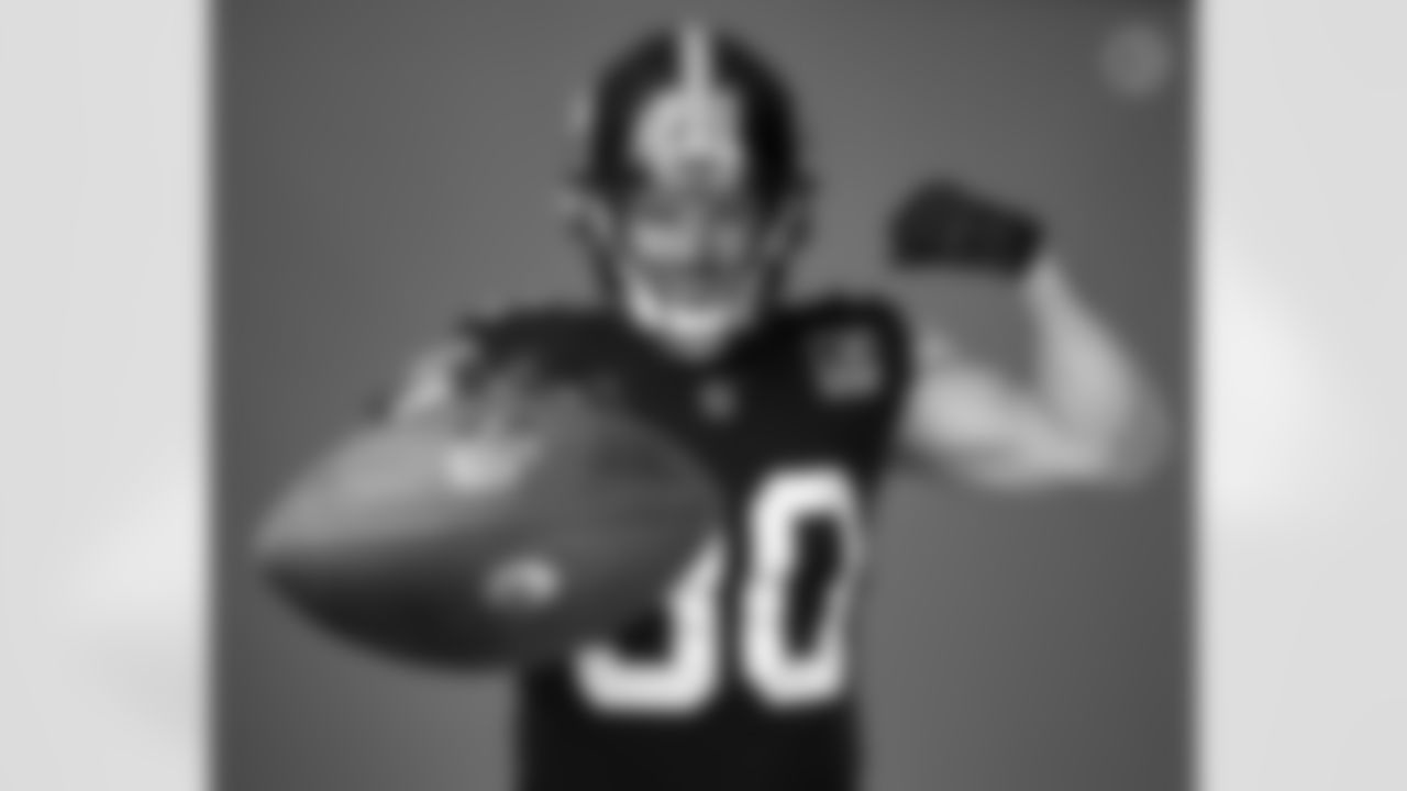 Pittsburgh Steelers linebacker T.J. Watt (90) wears the throwback uniform during a photoshoot, Tuesday, Nov. 15, 2022 in Pittsburgh, PA. (Karl Roser / Pittsburgh Steelers)