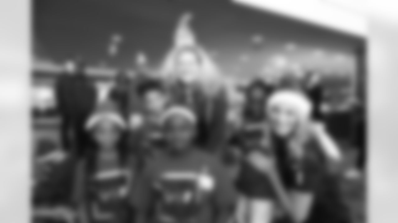 An image from the Dec. 20 2018 community development event. The Lady Texans threw a Holiday Party for the Texans YMCA at NRG Stadium.