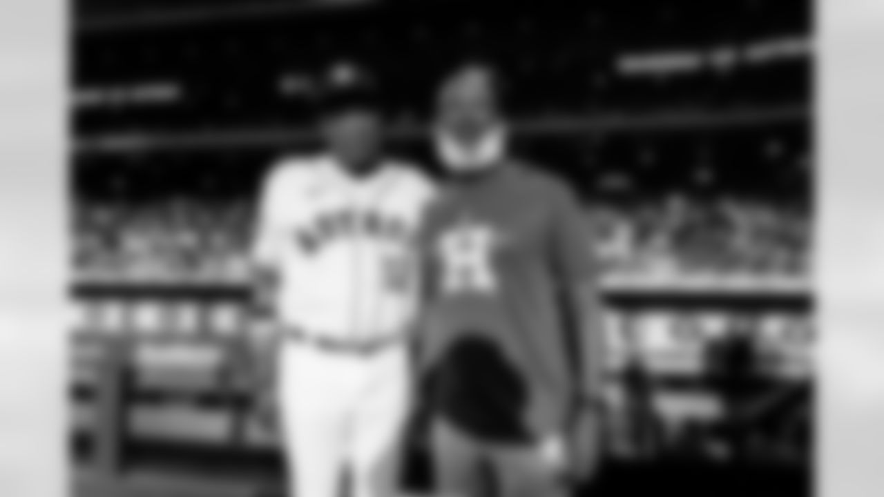 An image from rookies Derek Stingley Jr. and Kenyon Green throwing out the first pitch at the Astros game at Minute Maid Park in Houston, TX.