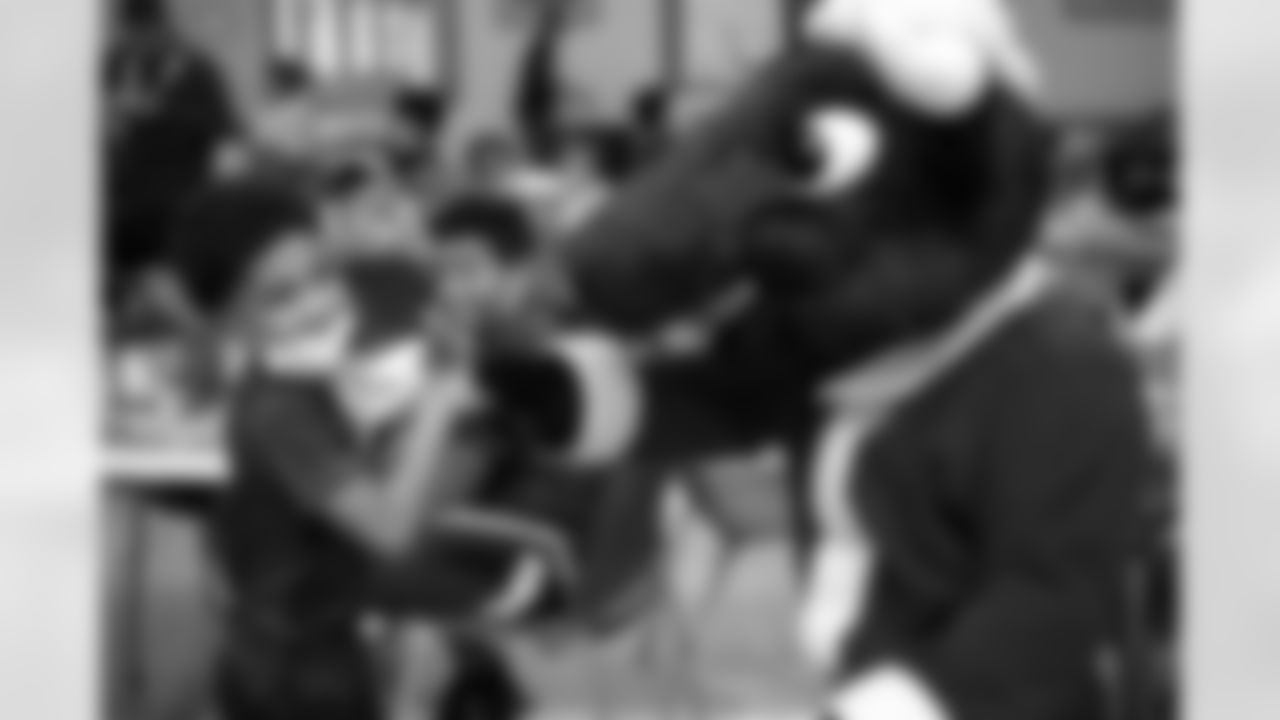 An image from Tyrod Taylor's holiday event in Houston, TX on Dec. 21, 2021.