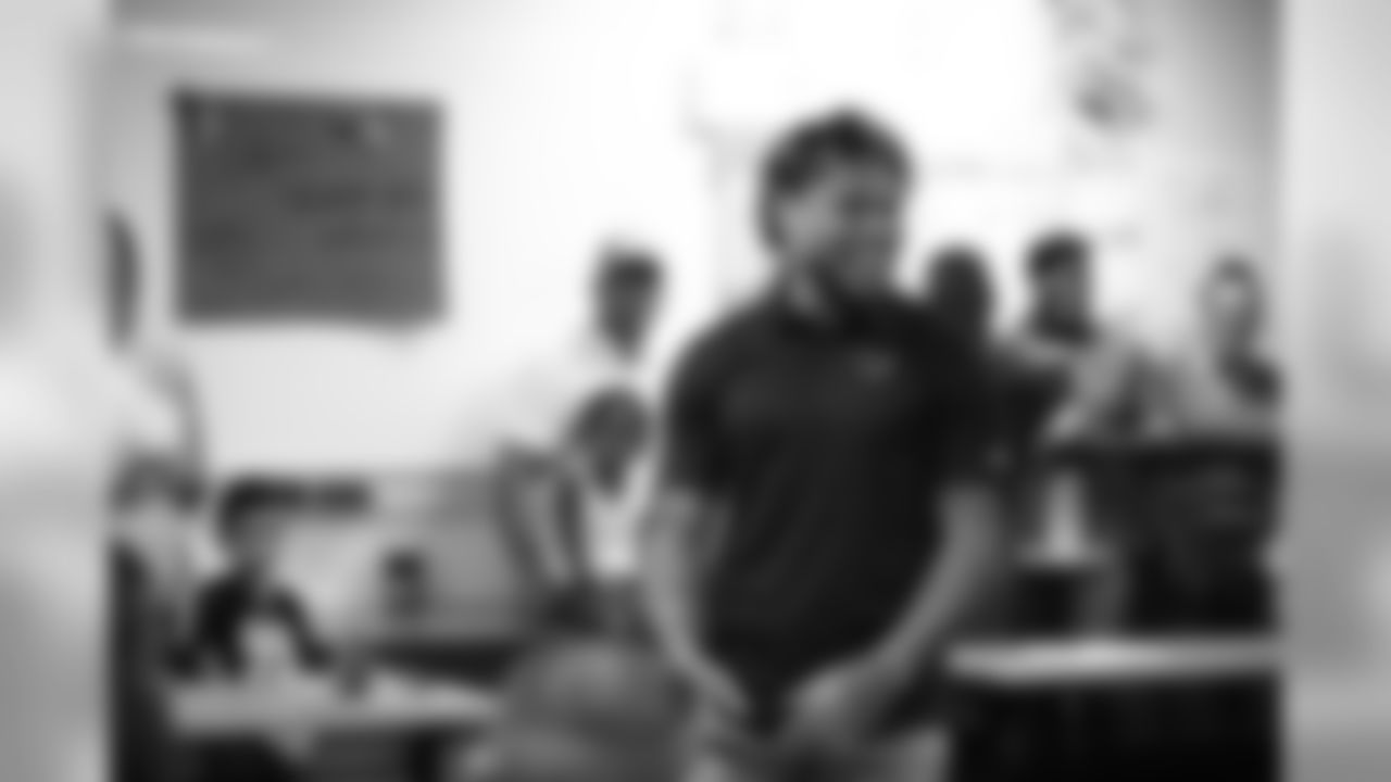 A July 23, 2018 photo from a community development event at Academy Sports and Outdoors in Humble, TX featuring Tyrann Mathieu.