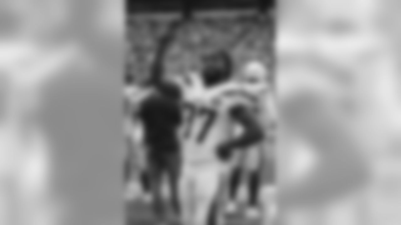 Los Angeles Chargers strong safety Jahleel Addae (37) gives a bit of a mocking celebration to fans after a Chargers score in the second half of an NFL football game, Sunday, Oct. 28, 2018, in Los Angeles. (AP Photo/Peter Joneleit)