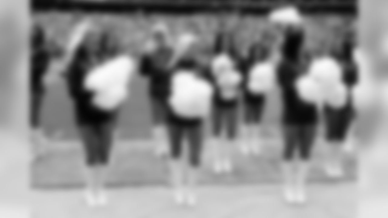 The Texans Cheerleaders in their rain gear