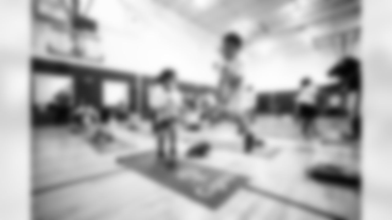 An image from the Cigna Just Flow Yoga event at the Harvard Boys and Girls Club in Houston, Texas, on Nov. 3, 2021.