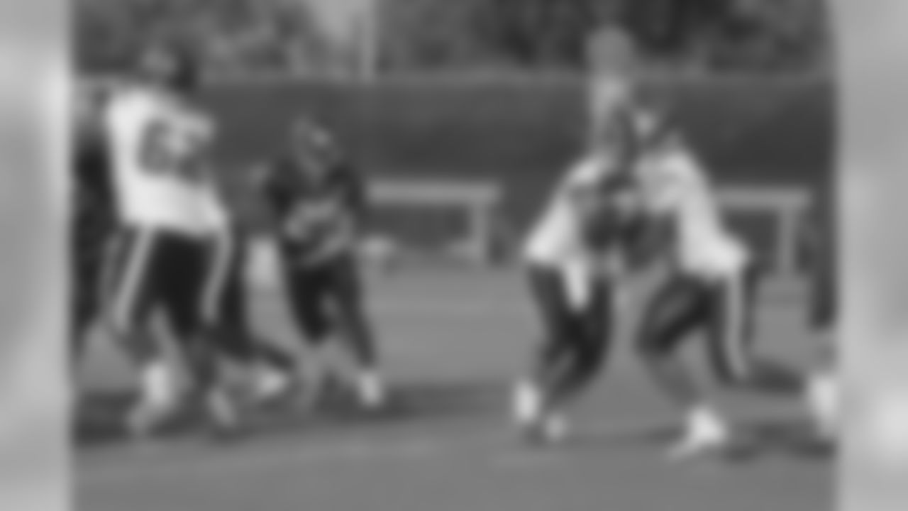 S Nick Ferguson and RB Ryan Moats