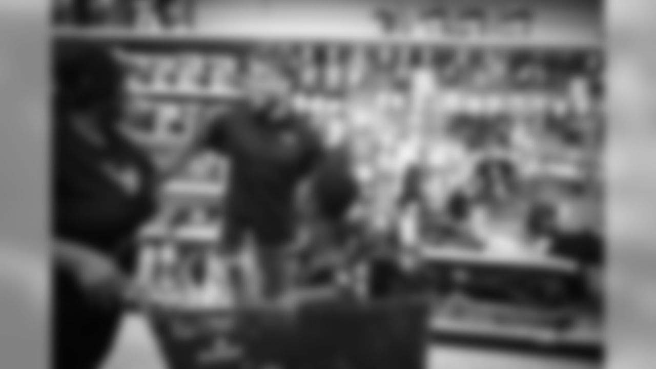 A July 23, 2018 photo from a community development event at Academy Sports and Outdoors in Humble, TX featuring Tyrann Mathieu.