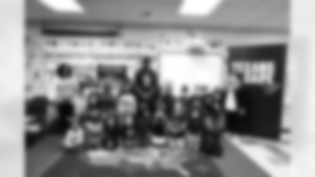 An image from the Nov. 16, 2021 community development event in which Brevin Jordan read Thanksgiving books a 1st grade classroom at The Rice School in Houston, TX.