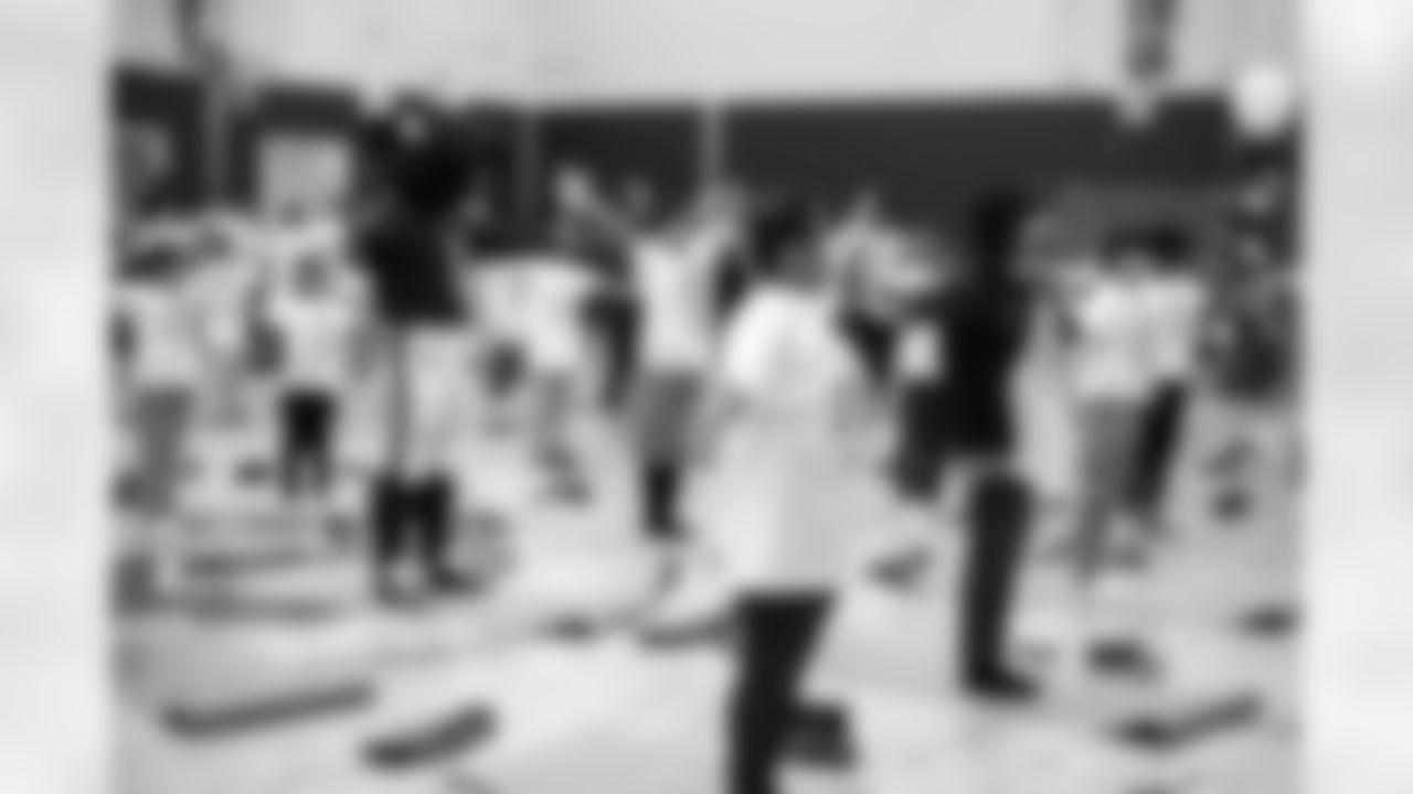An Oct. 19, 2022 Image from the Texans Youth Just Flow Yoga Event at Havard Boys & Girls Club in Houston, TX.