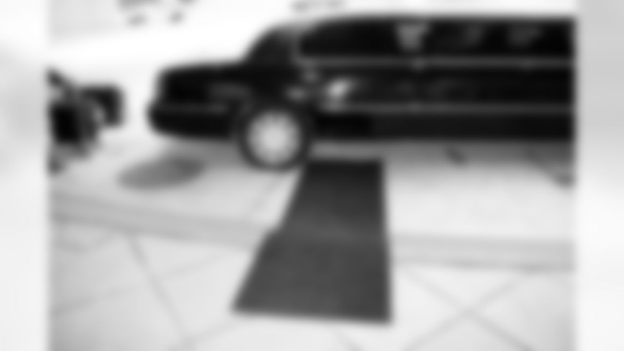 A limousine and red carpet await Brown and his family to take them back to Reliant Stadium.