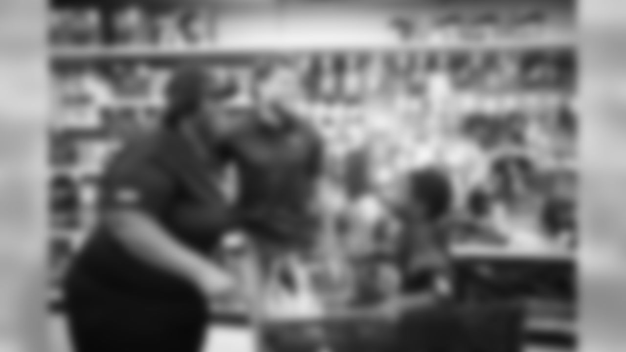 A July 23, 2018 photo from a community development event at Academy Sports and Outdoors in Humble, TX featuring Tyrann Mathieu.