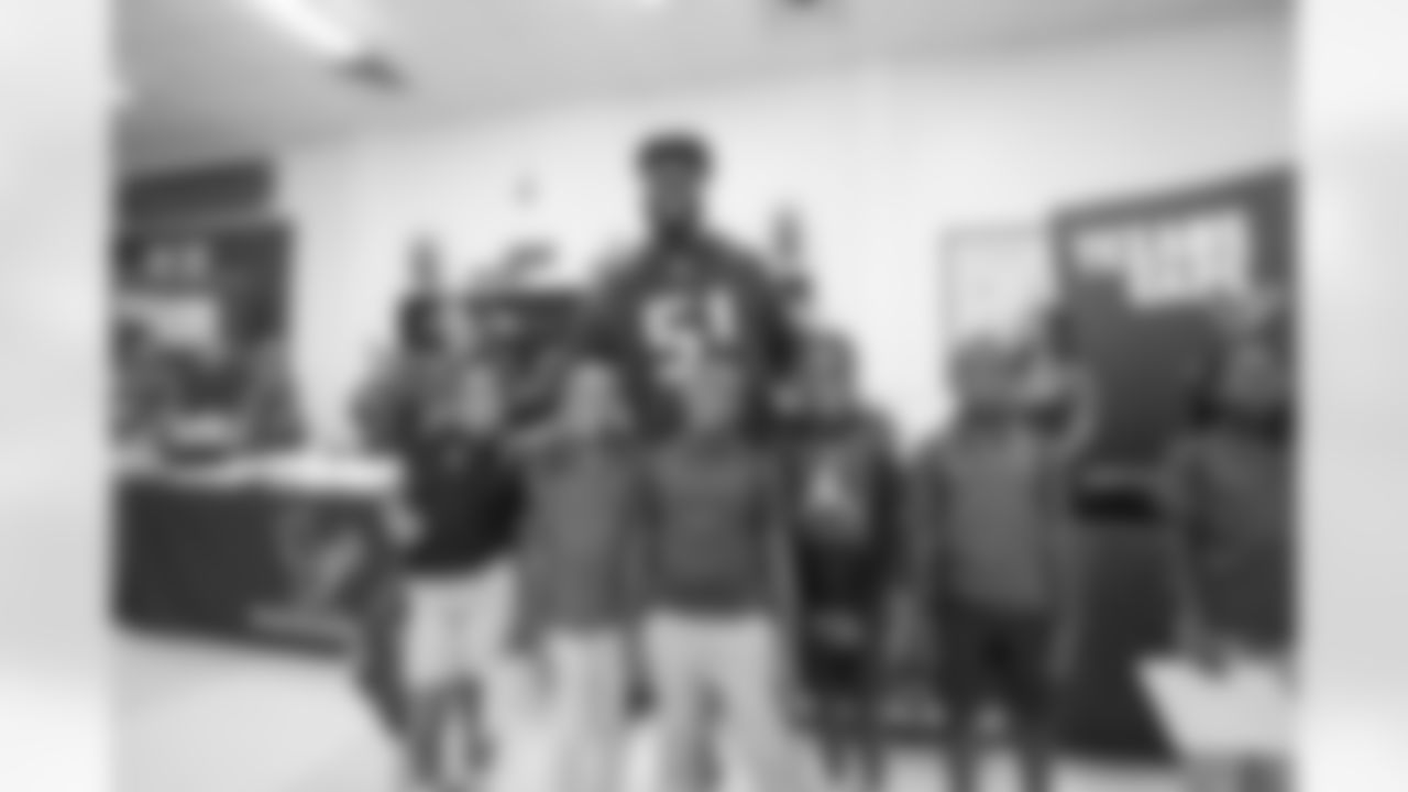 A September 12, 2023 image from the Texans Care CoolxDad picture day and Flag-in-Schools clinic at Blackshear Elementary School in Houston, TX.