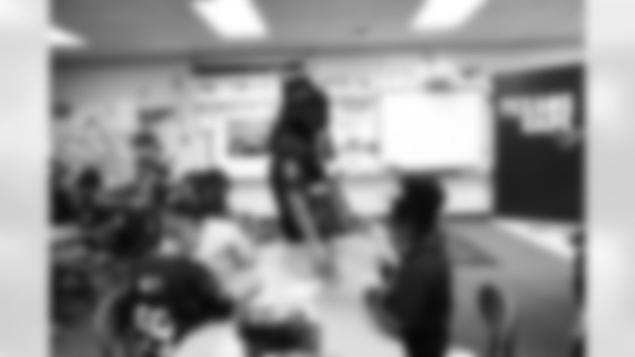 An image from the Nov. 16, 2021 community development event in which Brevin Jordan read Thanksgiving books a 1st grade classroom at The Rice School in Houston, TX.