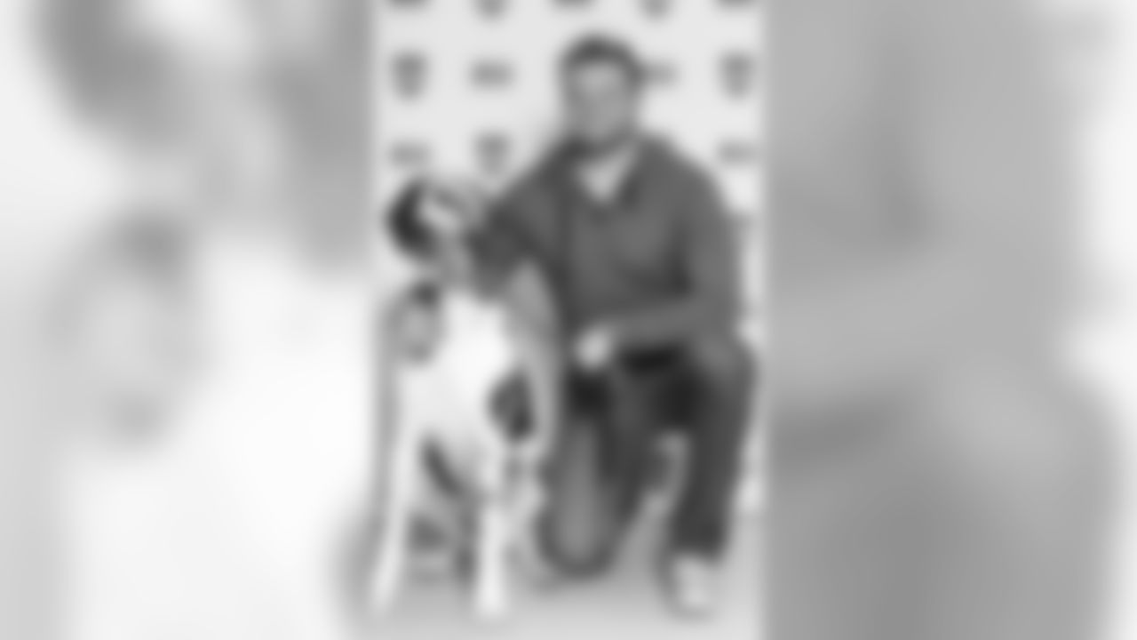 Jared Crick and his dog Odyssey at the Houston SPCA in support of Animal Planet's "Road to the Puppy Bowl" adoption event.