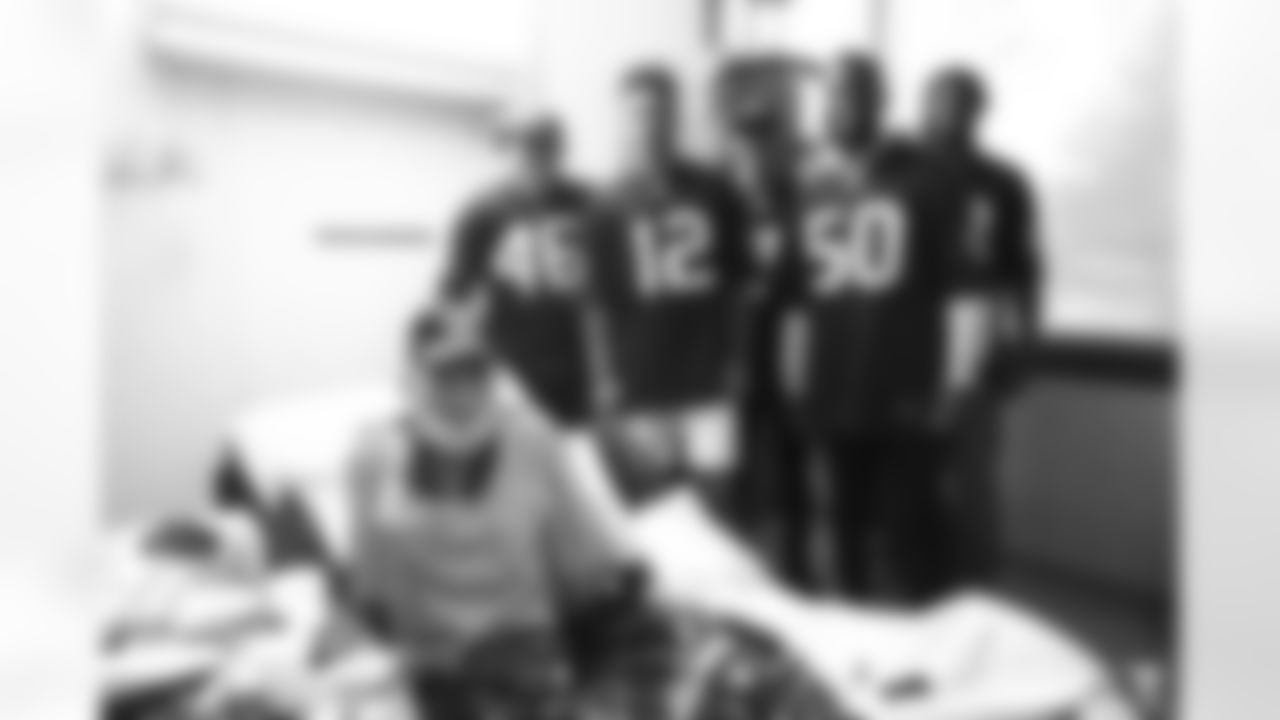 An image from the Nov. 26, 2019 community development event in which five Texans players visited patients at the Michael E. DeBakey VA Medical Center.