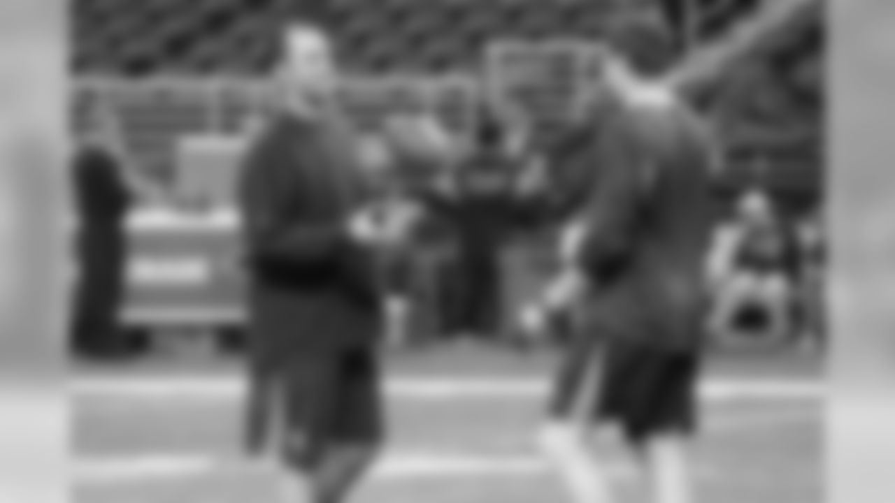 QB Matt Schaub and TE Joel Dreessen chat and warm up before the Rams game.