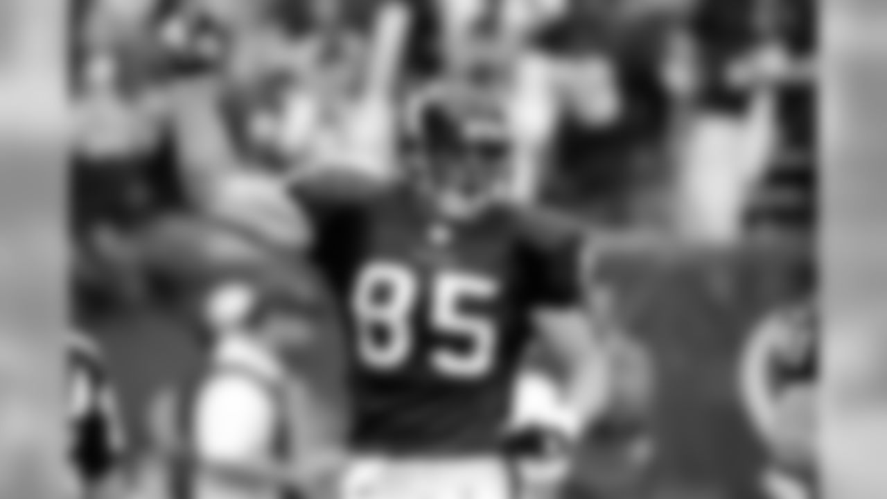 Tight end Joel Dreessen celebrates his touchdown.