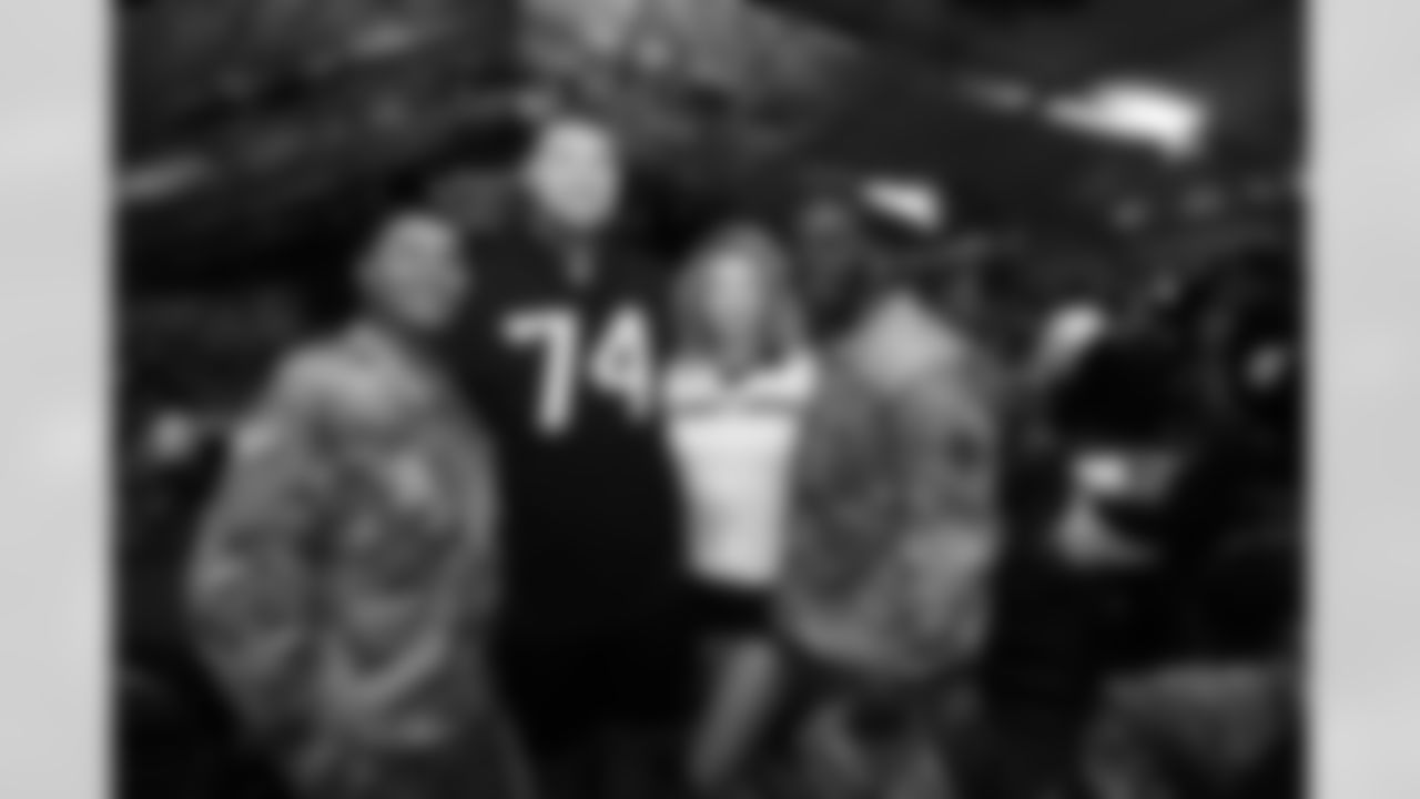 An image from the March 3, 2020 community development event in which Max Scharping and Kahale Warring visited military members at the Houston Rodeo.