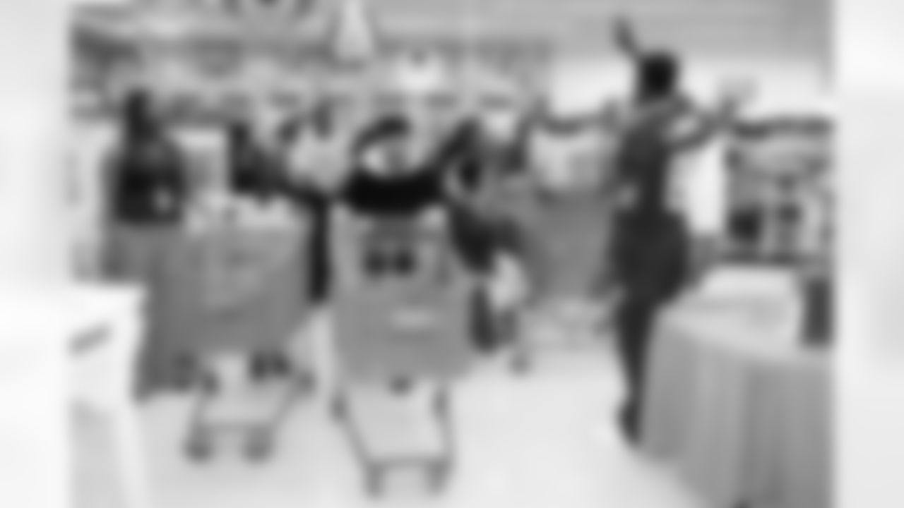 Johnson sets off a frantic 80 seconds of shopping by giving the eager children the go-ahead.