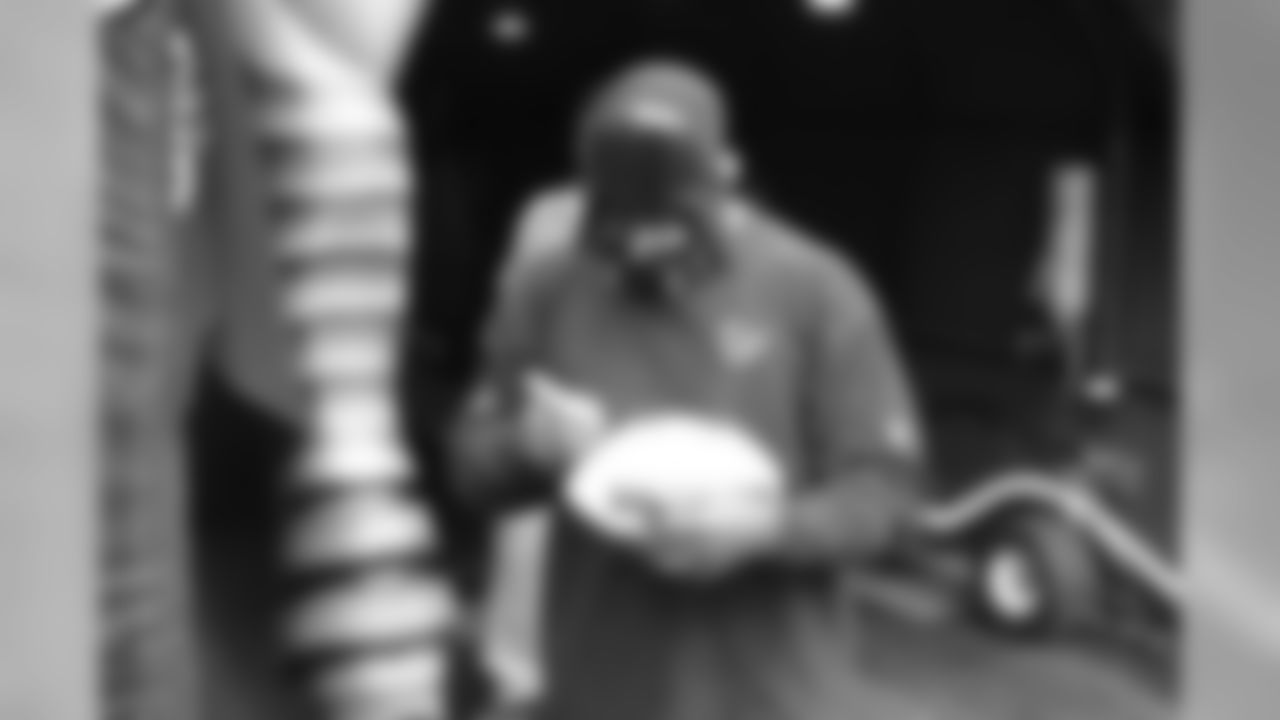 Darth Vader/SS Nick Ferguson signs autographs before the game