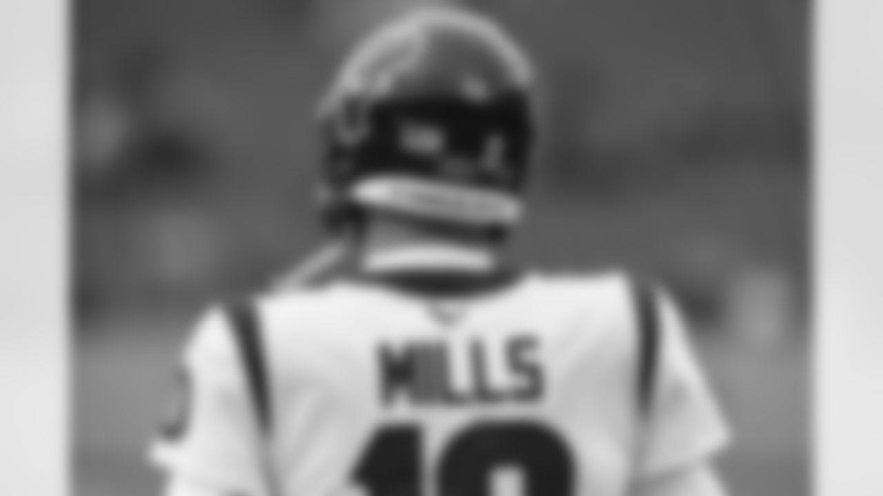 Houston Texans quarterback Davis Mills warms up before an NFL football game against the Tennessee Titans Sunday, Nov. 21, 2021, in Nashville, Tenn. (AP Photo/Mark Zaleski)
