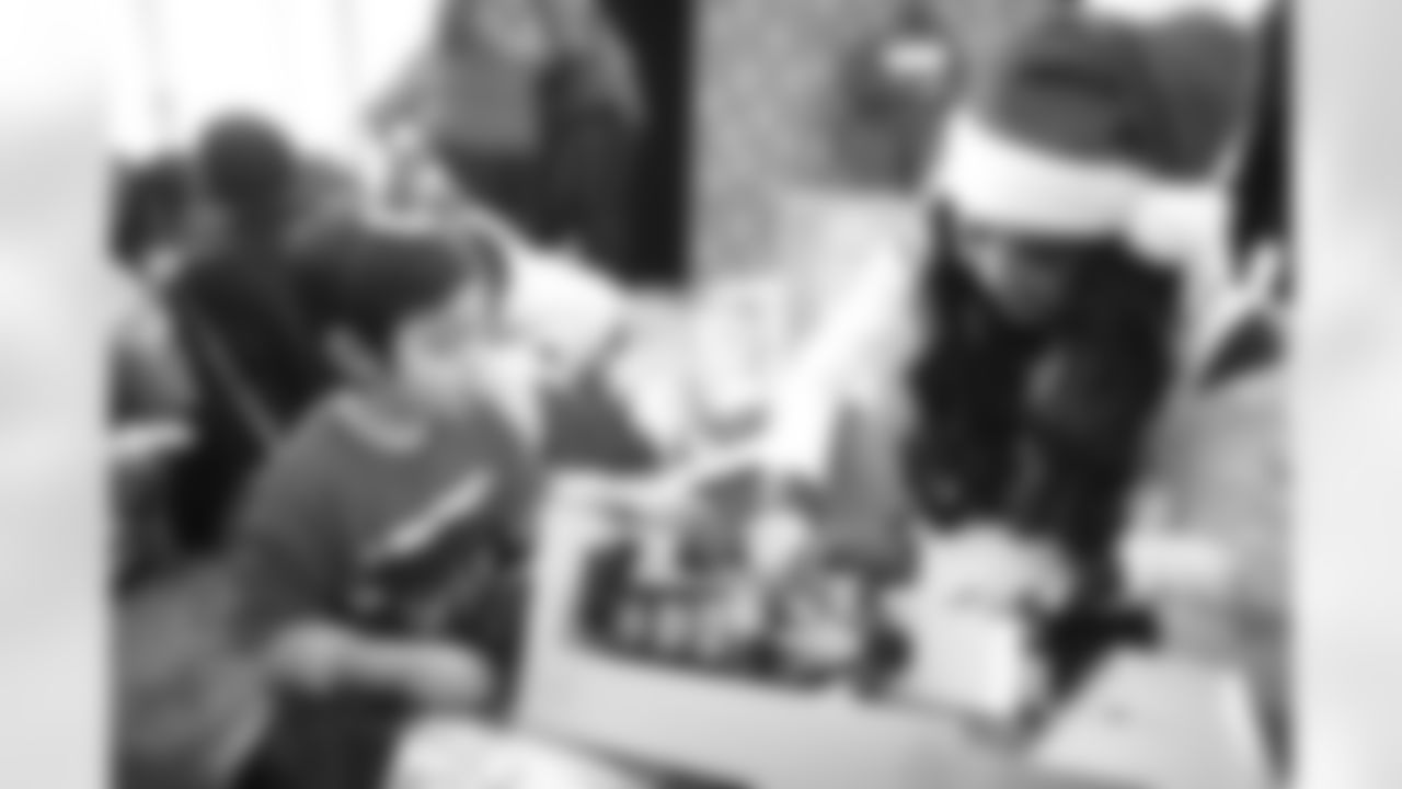 An image from the Dec. 20 2018 community development event. The Lady Texans threw a Holiday Party for the Texans YMCA at NRG Stadium.