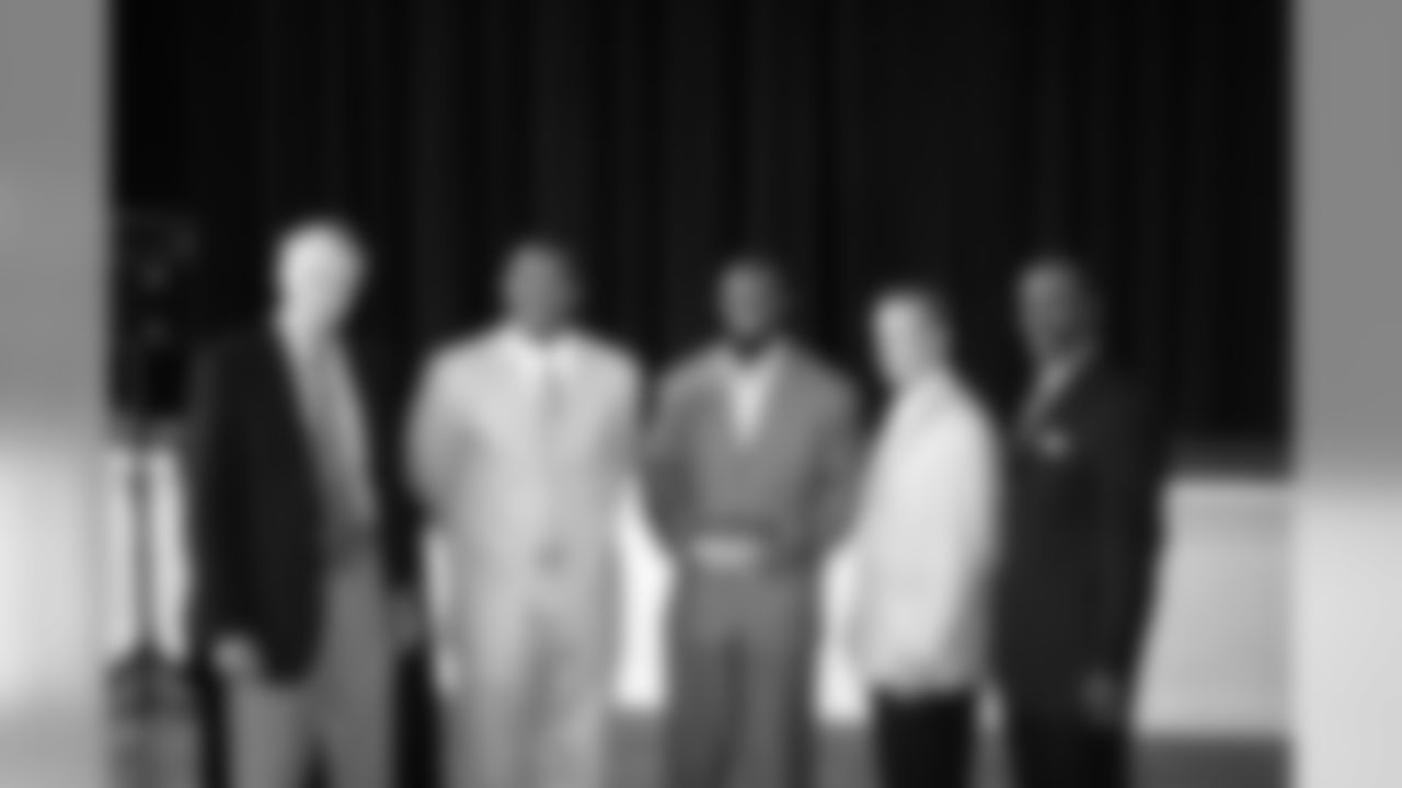Nebraska AD Tom Osborne, former Packers FB William Henderson, Green, high school teammate Jono Bradford and Green's uncle Michael Green.