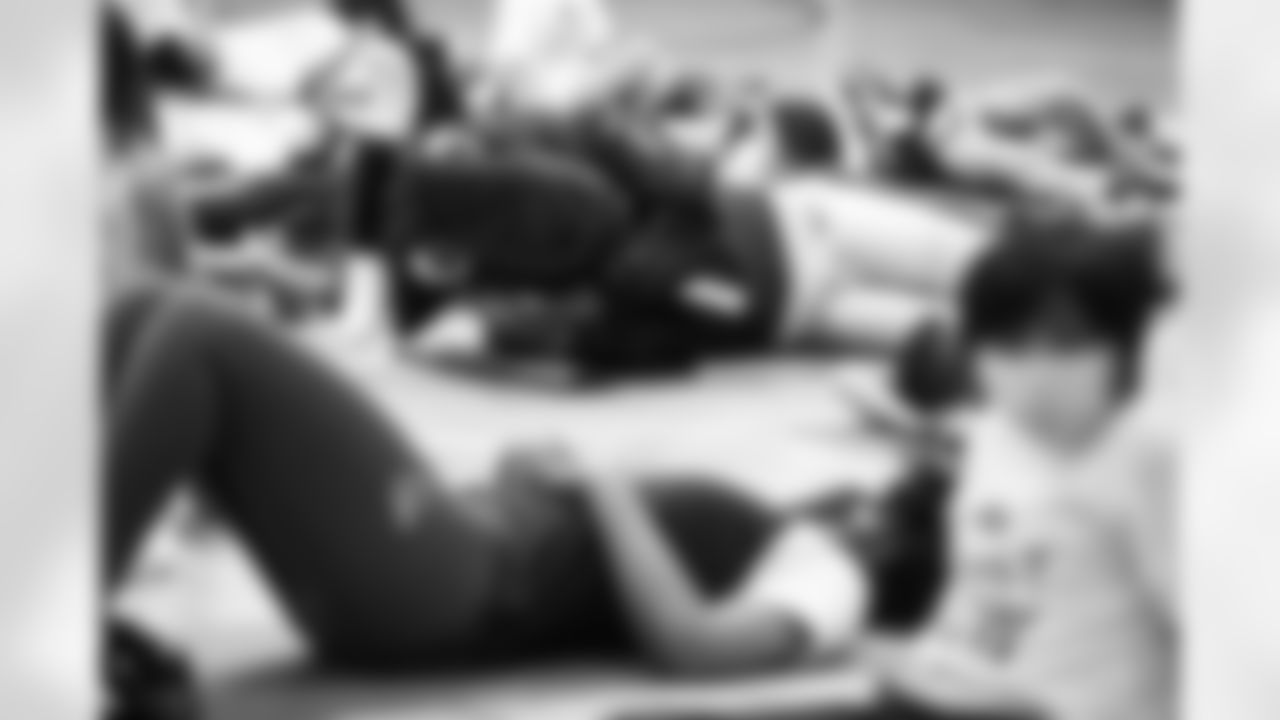 An image from the Cigna Just Flow Yoga event at the Harvard Boys and Girls Club in Houston, Texas, on Nov. 3, 2021.