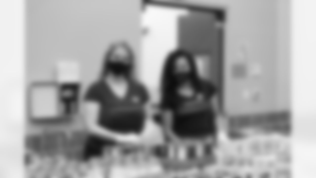 An image from the Apr. 10, 2021 HTC Alumni Houston Food Bank Giving Back event in Houston, TX.