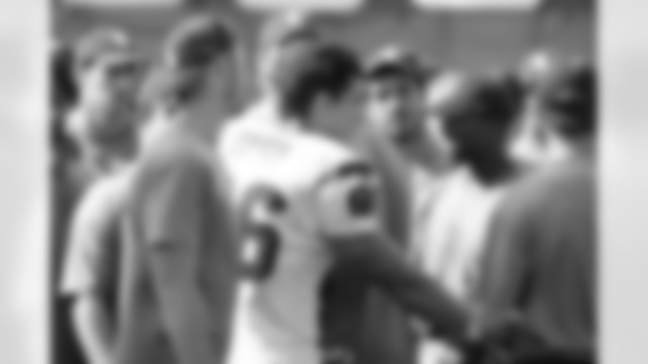TE James Casey greets his former Rice football teammates