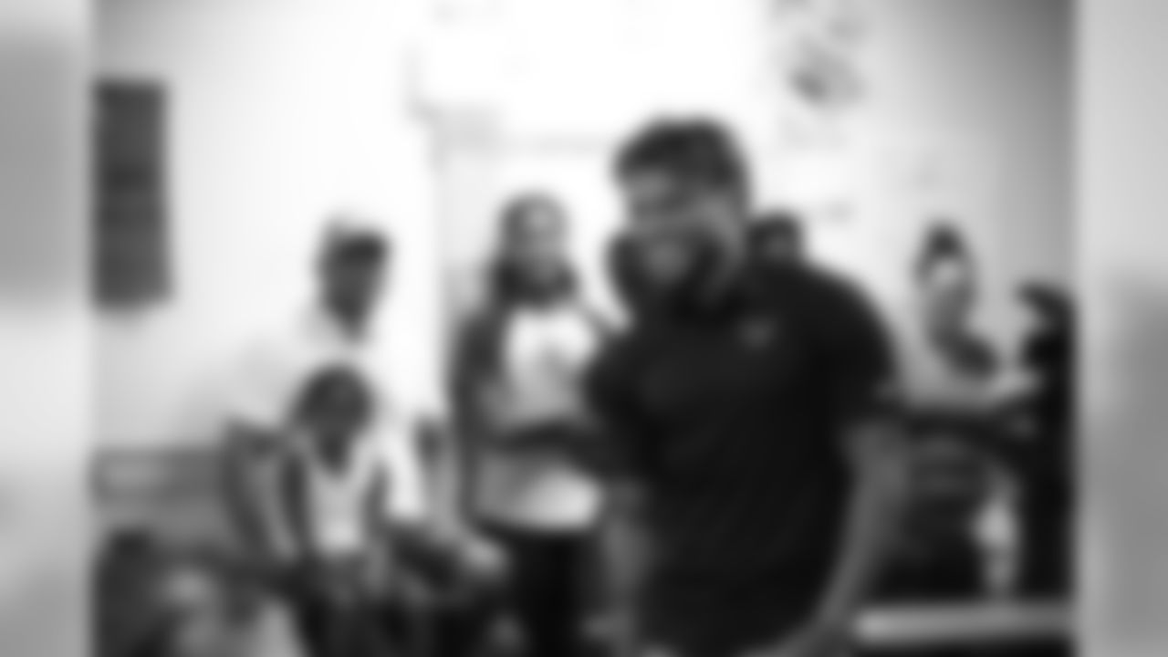 A July 23, 2018 photo from a community development event at Academy Sports and Outdoors in Humble, TX featuring Tyrann Mathieu.