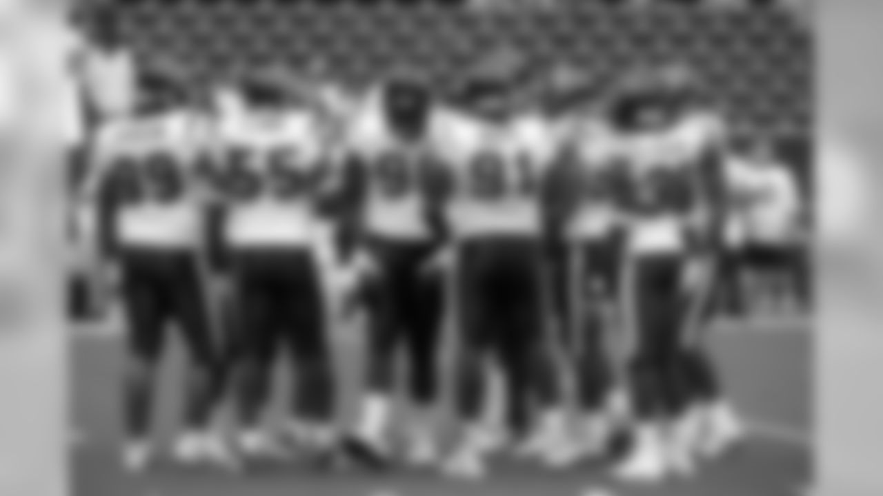The defense gathers for a huddle.