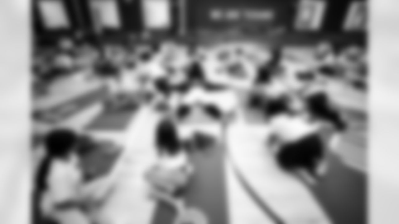 An image from the Cigna Just Flow Yoga event at the Harvard Boys and Girls Club in Houston, Texas, on Nov. 3, 2021.