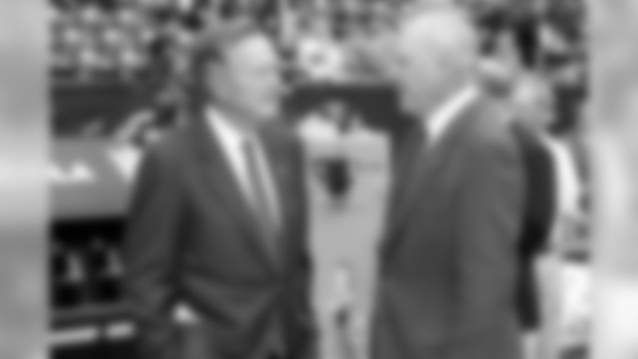 Texans owner Bob McNaIr and former President George Bush