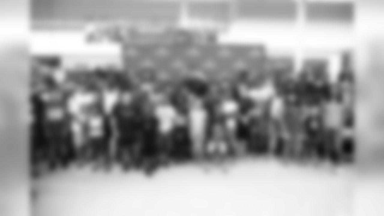 A July 23, 2018 photo from a community development event at Academy Sports and Outdoors in Humble, TX featuring Tyrann Mathieu.
