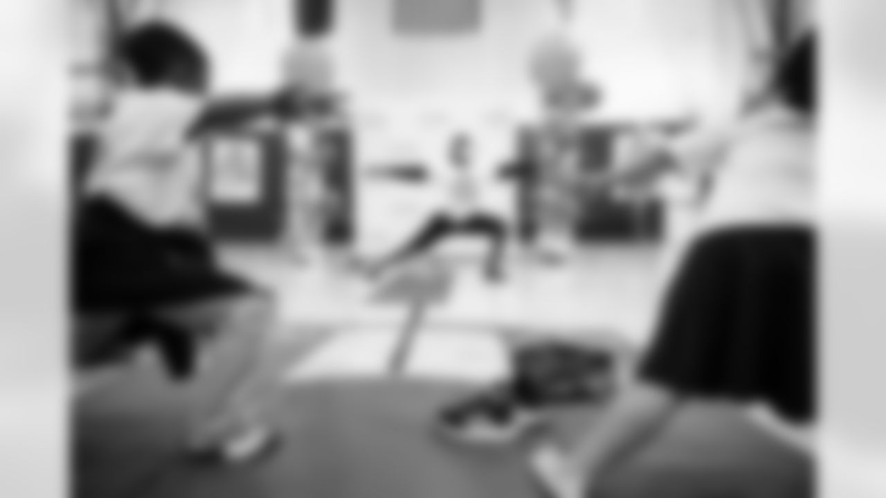 An image from the Cigna Just Flow Yoga event at the Harvard Boys and Girls Club in Houston, Texas, on Nov. 3, 2021.