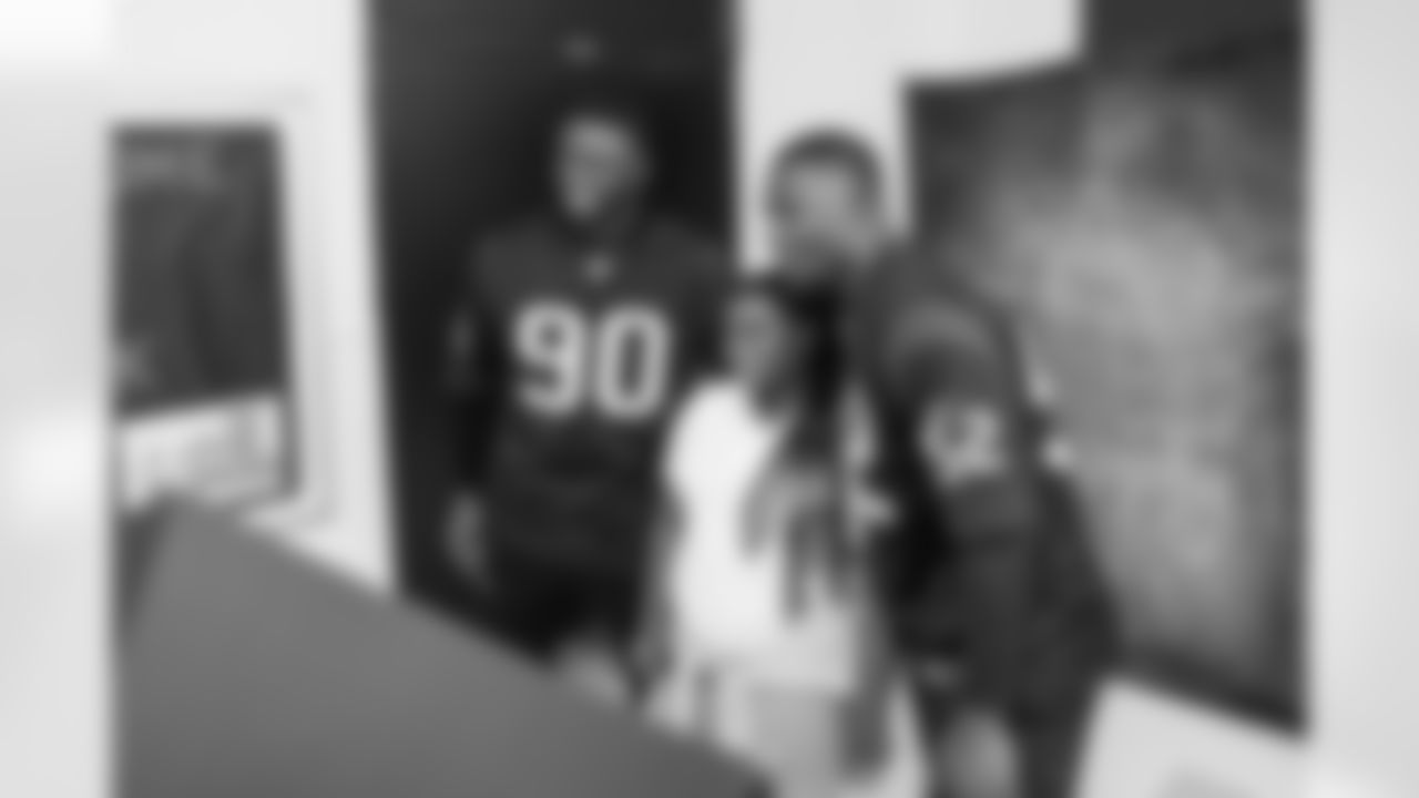 A September 12, 2023 image from the Texans Care CoolxDad picture day and Flag-in-Schools clinic at Blackshear Elementary School in Houston, TX.