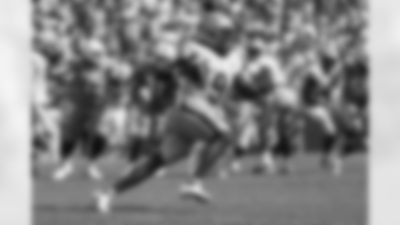 Pittsburgh defensive back Brandon Hill (9) returns an interception during the second half of an NCAA college football game against Tennessee, Saturday, Sept. 11, 2021, in Knoxville, Tenn. (AP Photo/Wade Payne)