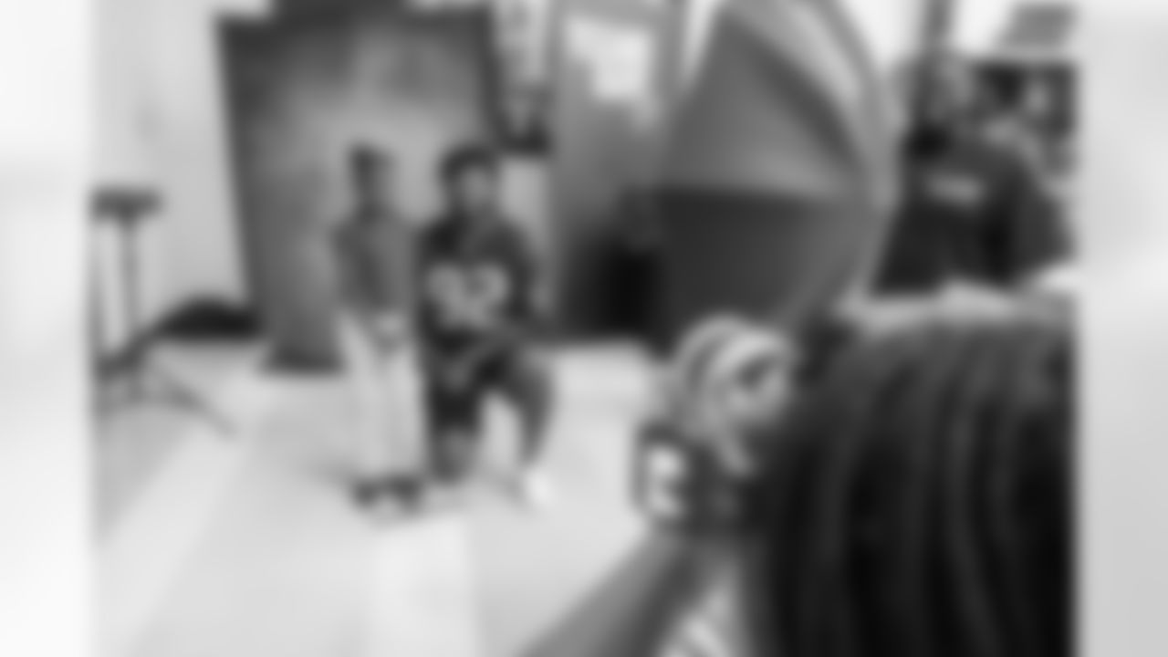 A September 12, 2023 image from the Texans Care CoolxDad picture day and Flag-in-Schools clinic at Blackshear Elementary School in Houston, TX.