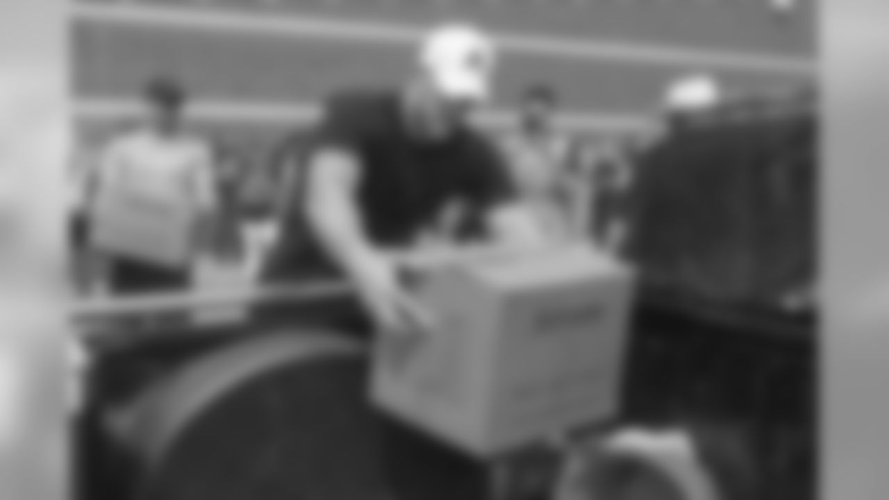 Houston Texans defensive lineman J.J. Watt, along with teammates and their families, help distribute relief supplies at four locations around Houston on Sunday, Sept. 3, 2017. J.J. Watt's Hurricane Harvey Relief Fund, which raised more than $18 million to date to help those affected by the storm. (Michelle Watson/Houston Texans, POOL)